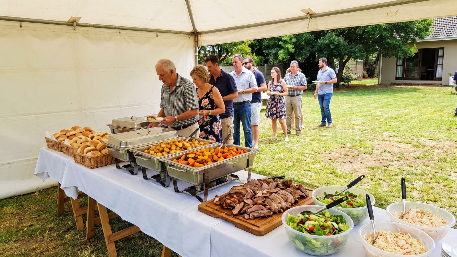 Spit braai prices include the buffet: carved lamb, garlic potatoes in chafing trays and bread rolls